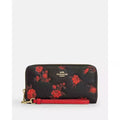 Coach CCL36 long zip-around wallet with floral print pebble leather in black and red, featuring a sleek design and multiple compartments.