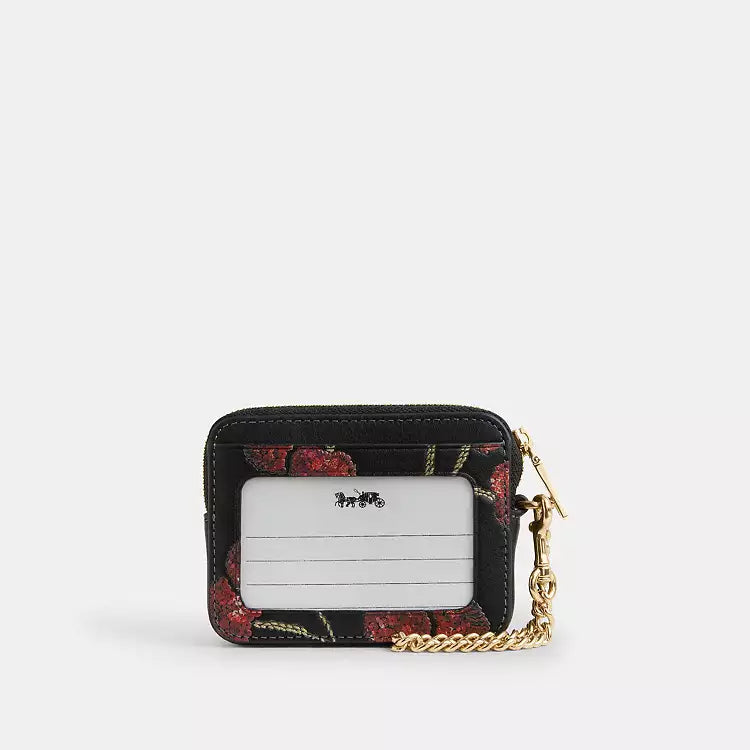 Coach CDF99 zip card case wallet with cherry print in gold and black, featuring multiple card slots and compact design.