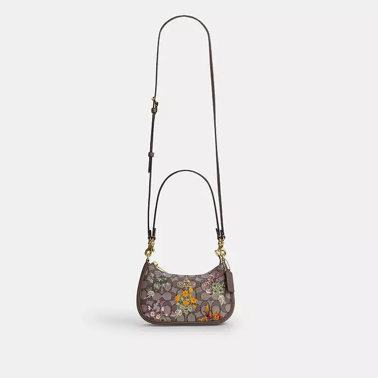 Coach Teri mini crossbody bag with signature jacquard and floral embroidery, stylish shoulder bag by The Tiny Bag.
