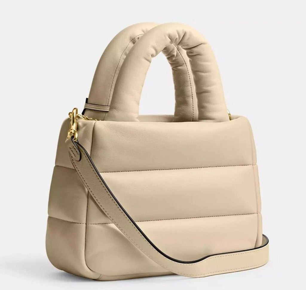 Coach Nappa leather Mini Pillow Tote Bag in ivory with soft pillow-like design and top handles, casual and stylish for everyday use.