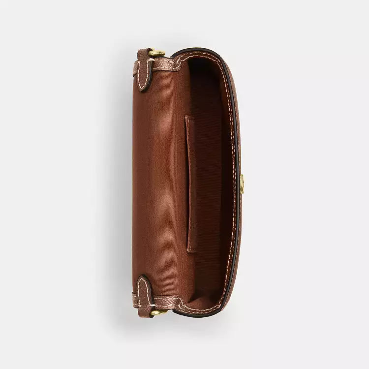 Coach Mini Josie Top Handle Bag in signature canvas with crossbody strap, brown and copper accents, small and stylish.