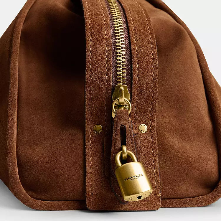 Coach Rogue 40 suede leather shoulder bag in brown with signature CC logo, stylish and spacious for everyday use.