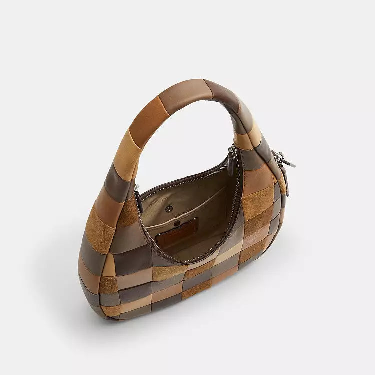 Coach Alter Ego Crescent Shoulder Bag in checkerboard pattern with brown and tan tones, featuring the CCX57 design.