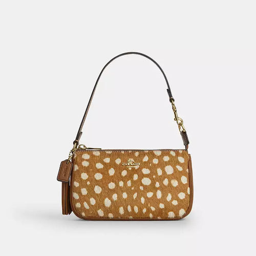 The Tiny Bag Coach Nolita 19 shoulder bag with deer print in brown multi, featuring a compact design and wristlet strap.