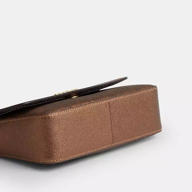 Coach Mini Josie top handle crossbody bag in signature canvas, brown and copper with a compact, stylish design.