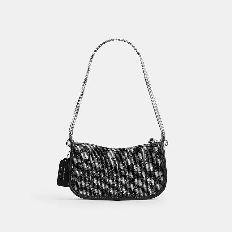 Coach Swinger 20 shoulder bag with chain in black crystal signature Jacquard fabric, compact and stylish from The Tiny Bag.
