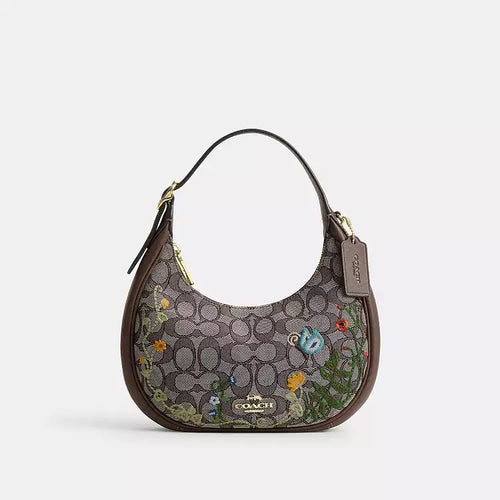 Coach Emily shoulder bag in signature jacquard with floral embroidery, stylish and compact bag from The Tiny Bag.