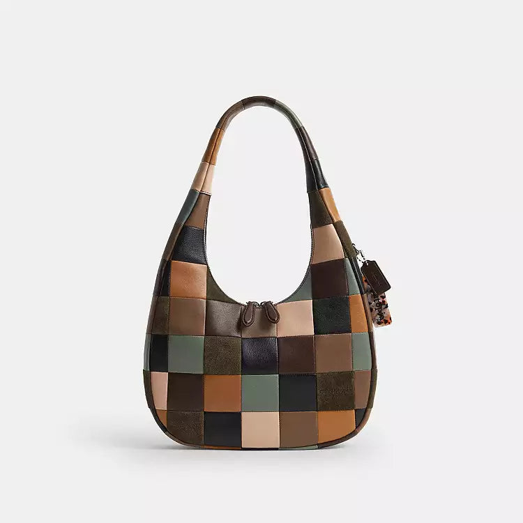 Coach Coachtopia Alter/Ego Crescent Shoulder Bag in leather and suede with CCX57 branding, featuring a stylish multi-color design.