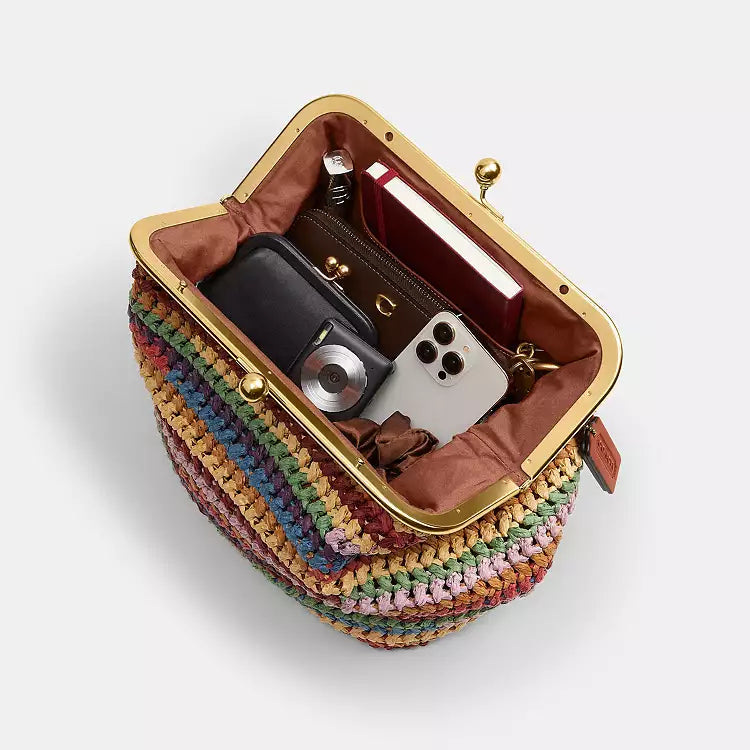 Multicolor straw Coach Kisslock large shoulder bag by The Tiny Bag with gold-tone hardware and spacious interior.