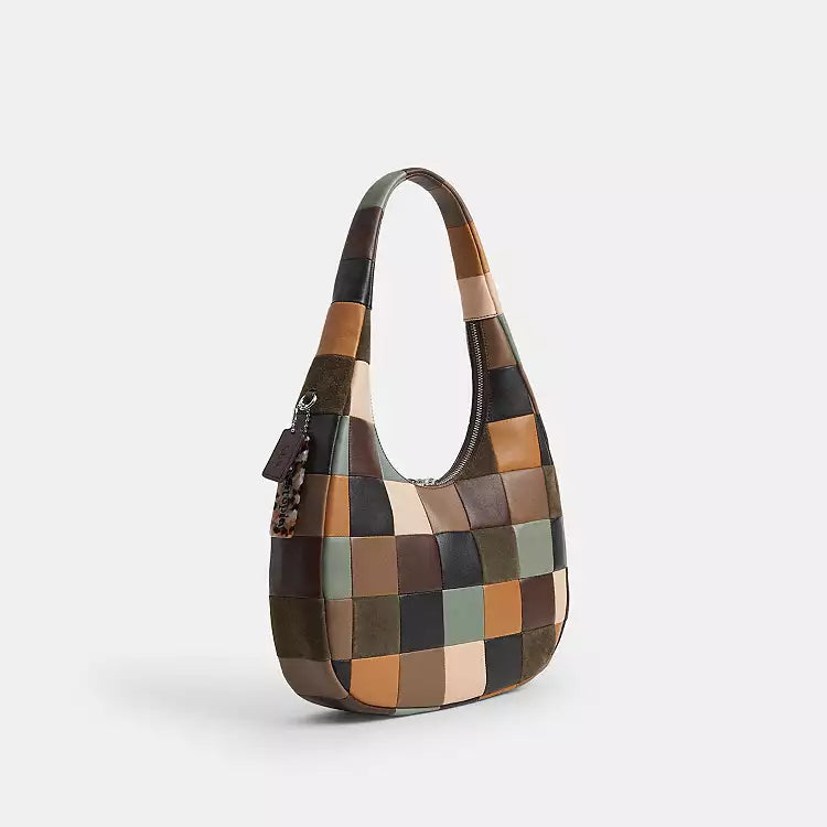 Coach Coachtopia Alter/Ego Crescent Shoulder Bag in leather and suede with CCX57 design, featuring a stylish, compact shoulder bag style.