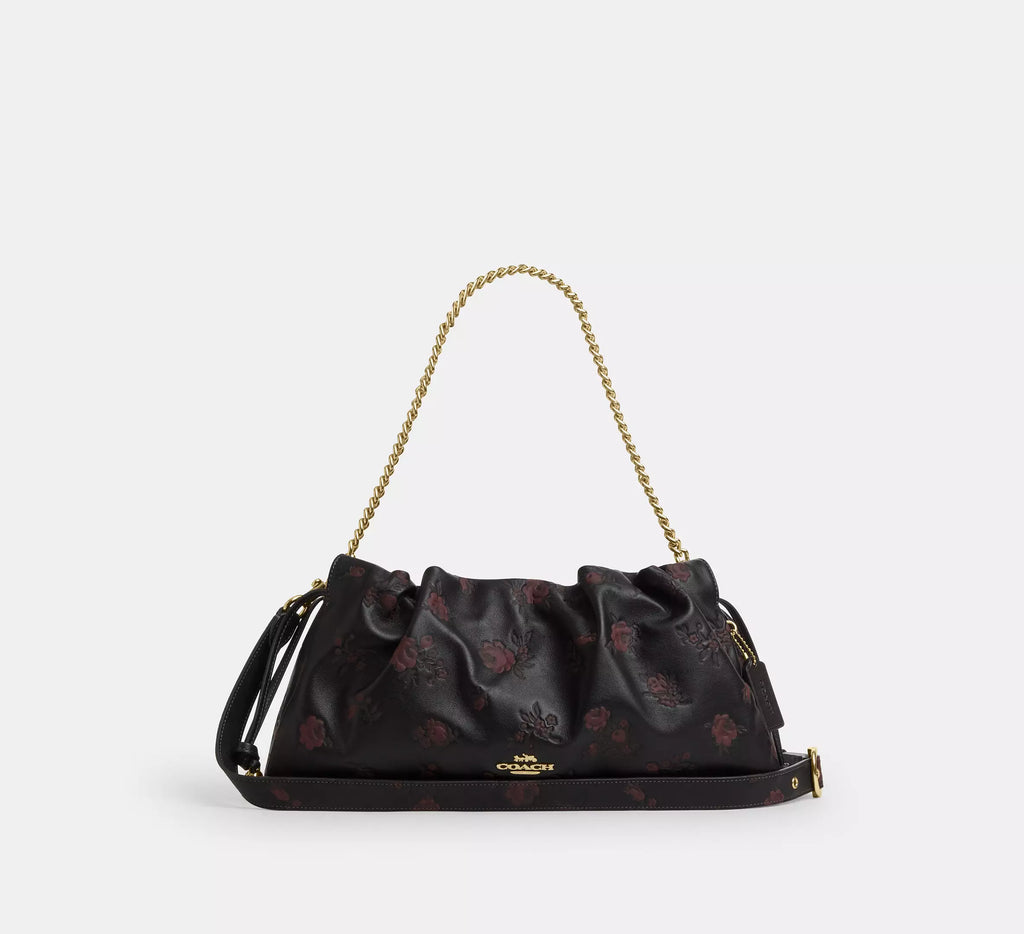 Coach Faye large shoulder bag with floral print leather in black and wine, featuring a spacious design and elegant style.