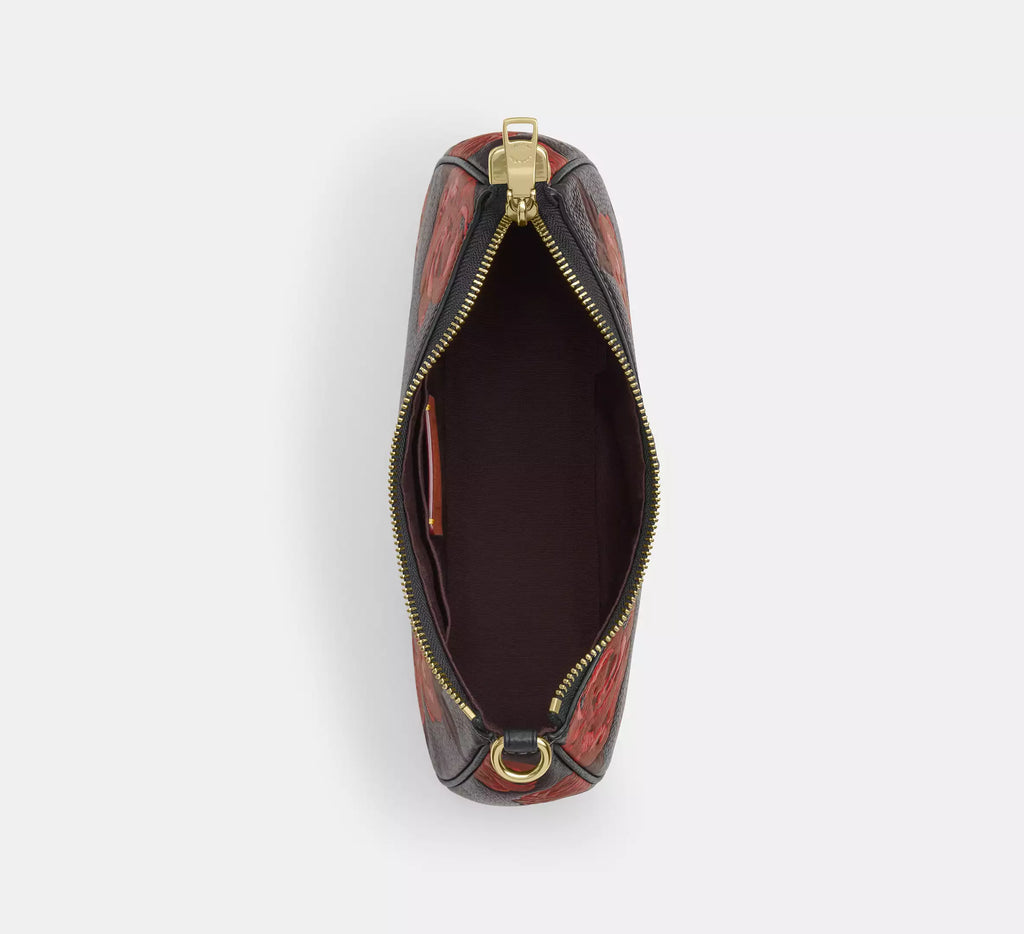 Coach Teri shoulder bag with floral print from The Tiny Bag, featuring a stylish design and soft leather finish.