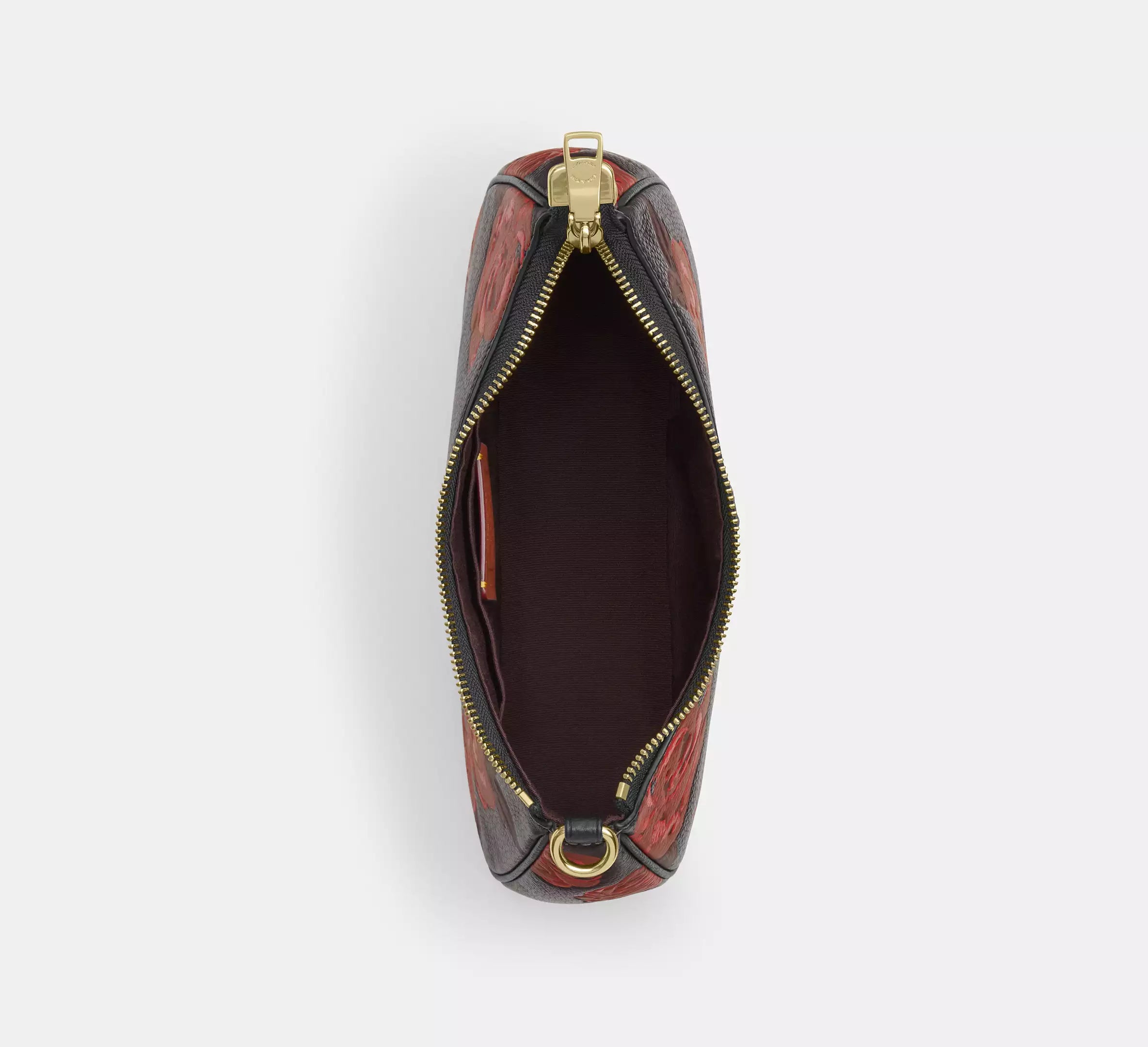 Coach Teri shoulder bag with floral print from The Tiny Bag, featuring a stylish design and soft leather finish.