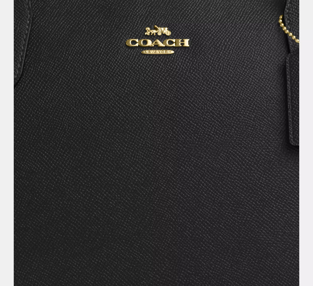 Black leather COACH Fiona zip tote bag with gold hardware, stylish and spacious tote bag by The Tiny Bag.