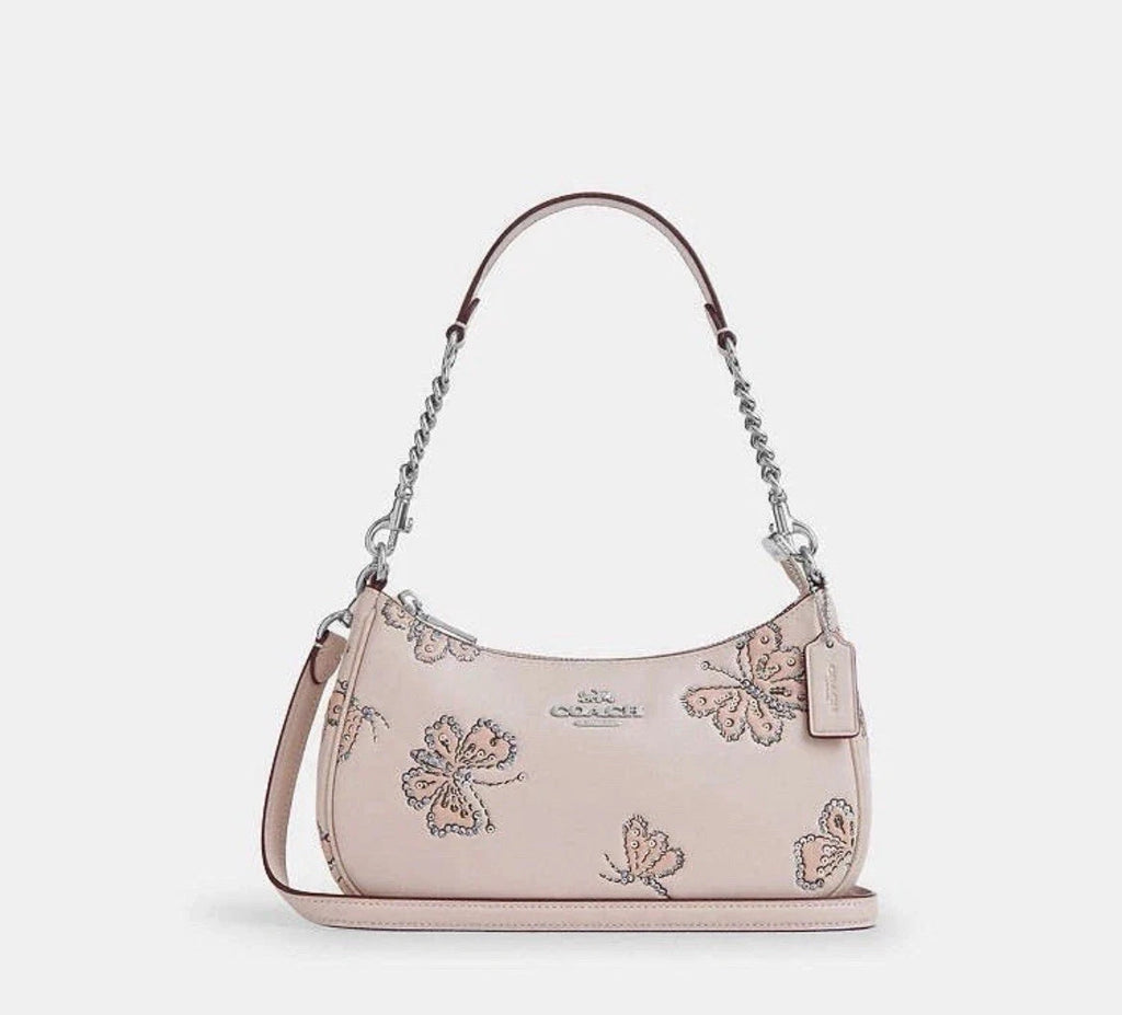 Coach Teri Shoulder Bag with butterfly print by The Tiny Bag, stylish leather bag featuring a colorful butterfly design.
